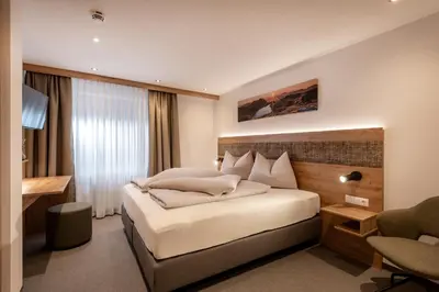 Ein Bett oder Betten in einem Zimmer der Unterkunft Gasthof Aschenwald
