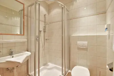 Ein Badezimmer in der Unterkunft Gasthof Aschenwald
