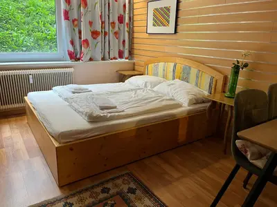 Ein Bett oder Betten in einem Zimmer der Unterkunft Appartements Alpin