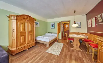 Ein Bett oder Betten in einem Zimmer der Unterkunft Appartements Alpin