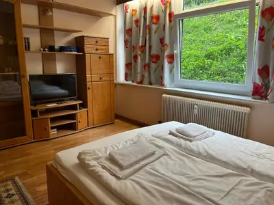 Ein Bett oder Betten in einem Zimmer der Unterkunft Appartements Alpin