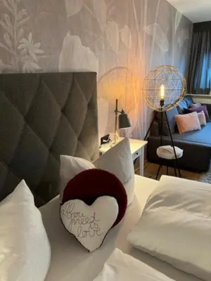 Ein Bett oder Betten in einem Zimmer der Unterkunft Gästehaus Weiherhof