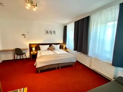 Ein Bett oder Betten in einem Zimmer der Unterkunft Bed & Rooms, Wörgl