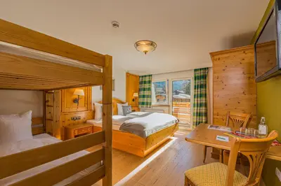 Ein Bett oder Betten in einem Zimmer der Unterkunft Lifesport Hotel Hechenmoos