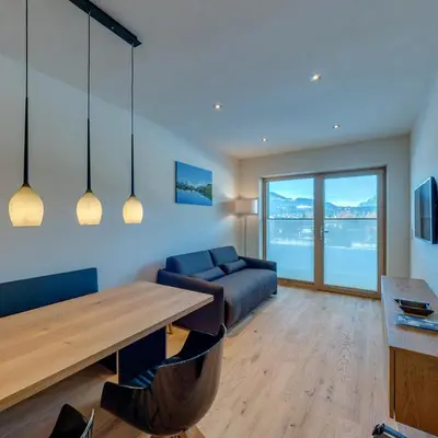 Ein Sitzbereich in der Unterkunft das Stefan - Ferienwohnungen in den Kitzbüheler Alpen