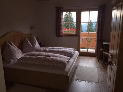 Ein Bett oder Betten in einem Zimmer der Unterkunft Bergpension-Ebental