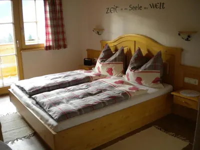 Ein Bett oder Betten in einem Zimmer der Unterkunft Bergpension-Ebental