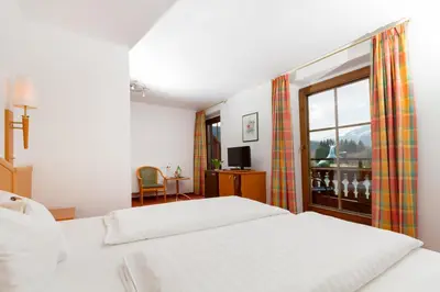 Ein Bett oder Betten in einem Zimmer der Unterkunft Bruggerhof - Camping, Restaurant, Hotel
