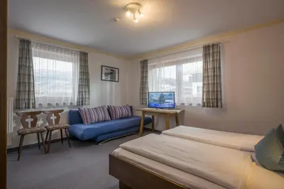 Ein Bett oder Betten in einem Zimmer der Unterkunft Ferienhaus Resi & Obermoser