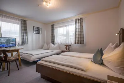 Ein Bett oder Betten in einem Zimmer der Unterkunft Ferienhaus Resi & Obermoser