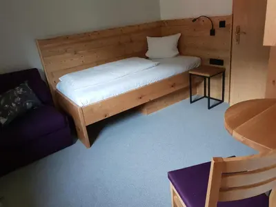 Ein Bett oder Betten in einem Zimmer der Unterkunft Gästehaus Wallner