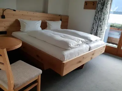 Ein Bett oder Betten in einem Zimmer der Unterkunft Gästehaus Wallner