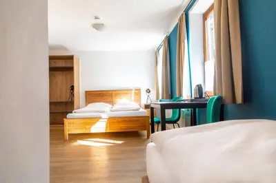 Ein Bett oder Betten in einem Zimmer der Unterkunft Sаfestay Kitzbühel Alpine l Self-Check-In