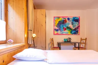 Ein Bett oder Betten in einem Zimmer der Unterkunft Sаfestay Kitzbühel Alpine l Self-Check-In