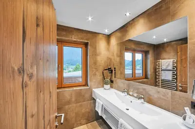 Ein Badezimmer in der Unterkunft Aparthotel Bergland