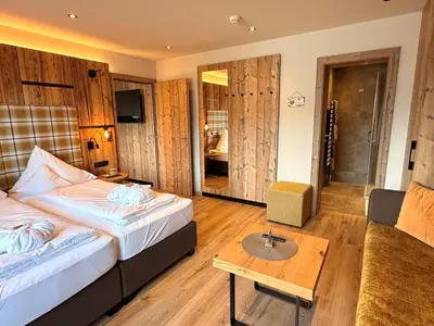Ein Bett oder Betten in einem Zimmer der Unterkunft Aparthotel Bergland