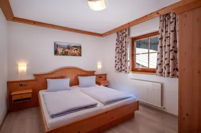 Ein Bett oder Betten in einem Zimmer der Unterkunft Activ Wellness - Appartement Schermerhof