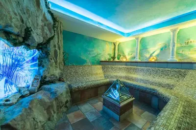 Ein Sitzbereich in der Unterkunft Hotel Riedl