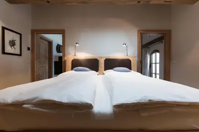 Ein Bett oder Betten in einem Zimmer der Unterkunft Gasthof Weyerhof