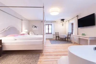 Ein Bett oder Betten in einem Zimmer der Unterkunft Gasthof Weyerhof
