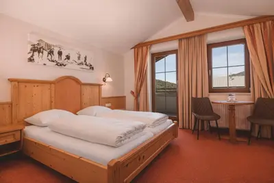 Ein Bett oder Betten in einem Zimmer der Unterkunft Loipenstubn