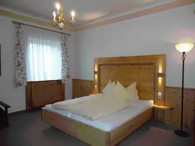 Ein Bett oder Betten in einem Zimmer der Unterkunft Landgasthof Dorferwirt