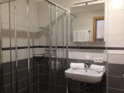 Ein Badezimmer in der Unterkunft Ferienwohnungen Karwendel Camping