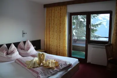 Ein Bett oder Betten in einem Zimmer der Unterkunft Gastehaus Egger
