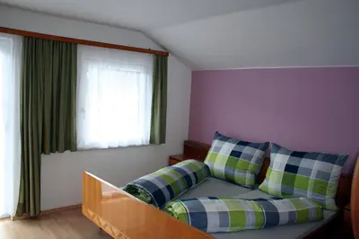 Ein Bett oder Betten in einem Zimmer der Unterkunft Appartements-Christian
