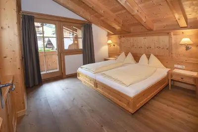 Ein Bett oder Betten in einem Zimmer der Unterkunft Gästehaus Larch