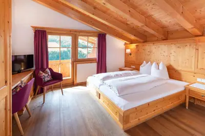 Ein Bett oder Betten in einem Zimmer der Unterkunft Gästehaus Larch