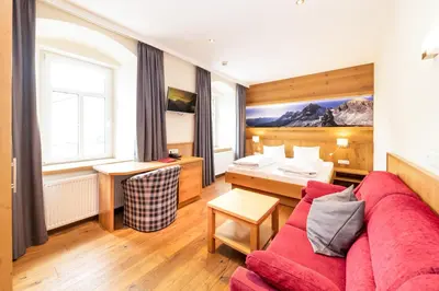 Ein Sitzbereich in der Unterkunft Hotel Heitzmann