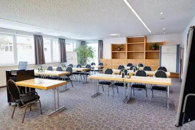 Der Geschäftsbereich oder Konferenzraum in der Unterkunft Alpenrose Kufstein
