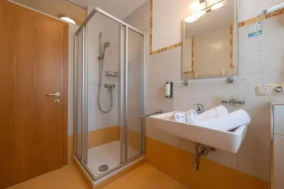 Ein Badezimmer in der Unterkunft Pension Haus in der Sonne