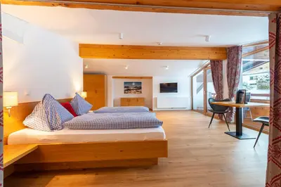 Ein Bett oder Betten in einem Zimmer der Unterkunft Pension Haus in der Sonne