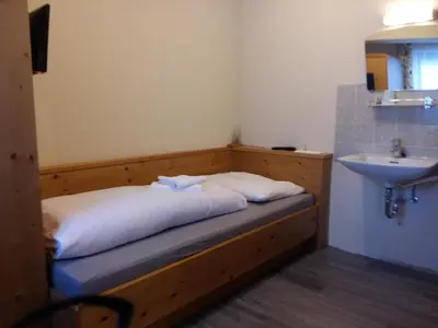 Ein Bett oder Betten in einem Zimmer der Unterkunft Haus Kropf