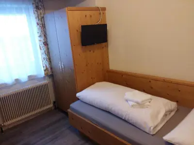 Ein Bett oder Betten in einem Zimmer der Unterkunft Haus Kropf