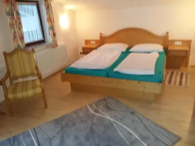 Ein Bett oder Betten in einem Zimmer der Unterkunft Haus Kropf