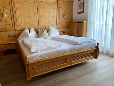 Ein Bett oder Betten in einem Zimmer der Unterkunft Landhotel Strasserwirt