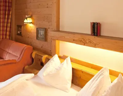 Ein Bett oder Betten in einem Zimmer der Unterkunft Landhotel Strasserwirt