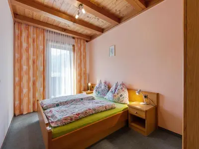 Ein Bett oder Betten in einem Zimmer der Unterkunft Spacious Apartment near Ski Area in Mittersill