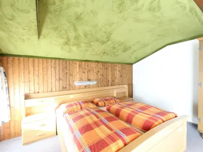 Ein Bett oder Betten in einem Zimmer der Unterkunft Spacious Apartment near Ski Area in Mittersill