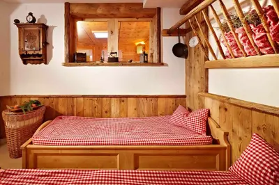 Ein Bett oder Betten in einem Zimmer der Unterkunft Hotel Riedl im Zillertal