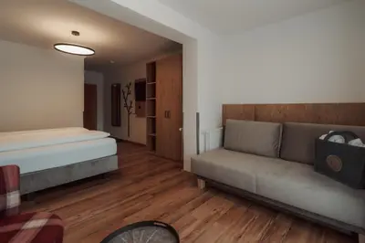 Ein Bett oder Betten in einem Zimmer der Unterkunft Hotel Tannenberg