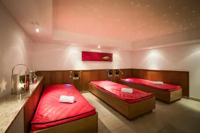 Ein Bett oder Betten in einem Zimmer der Unterkunft Hotel Tannenberg