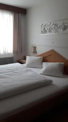 Ein Bett oder Betten in einem Zimmer der Unterkunft Ferienwohnungen Regina Unger
