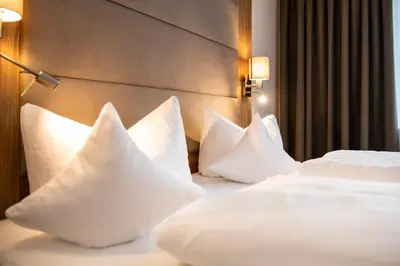 Ein Bett oder Betten in einem Zimmer der Unterkunft Hotel Elisabeth