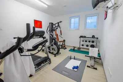 Das Fitnesscenter und/oder die Fitnesseinrichtungen in der Unterkunft Hotel Grundlhof