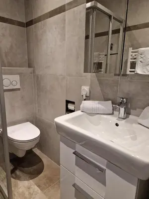 Ein Badezimmer in der Unterkunft Haus Bergblick
