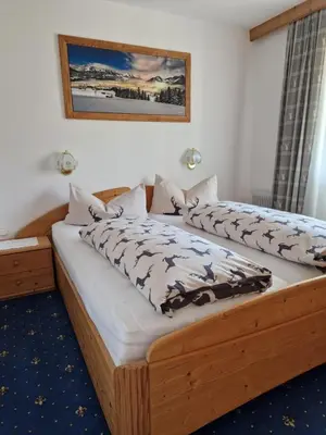 Ein Bett oder Betten in einem Zimmer der Unterkunft Haus Bergblick